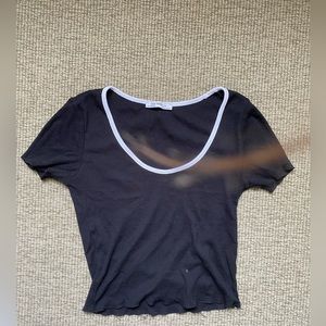 Black scoop neck cropped shirt with white trim